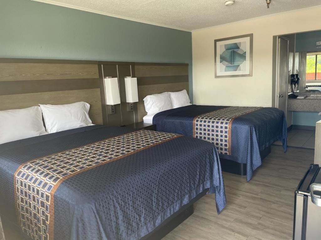 Executive Inn & Suites Бомонт Екстер'єр фото